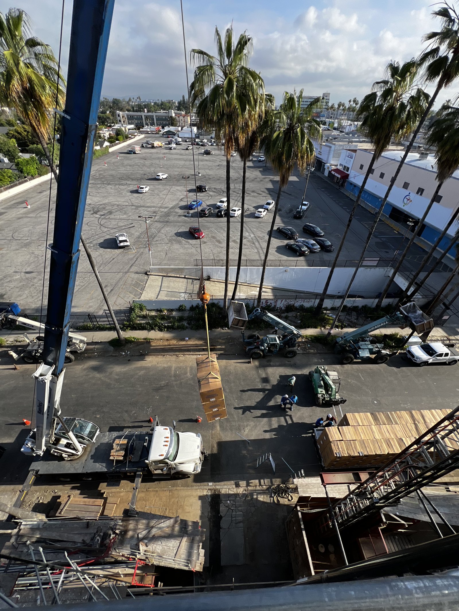 Crane-assisted equipment delivery